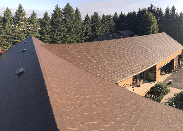 Worker's perspective on a finished Kodiak Metal Roof.