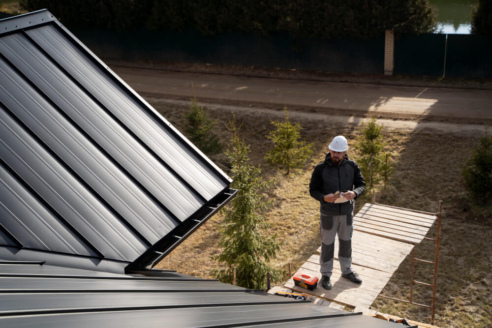 Modern Ontario home with a stylish metal roof under clear blue skies in 2025.